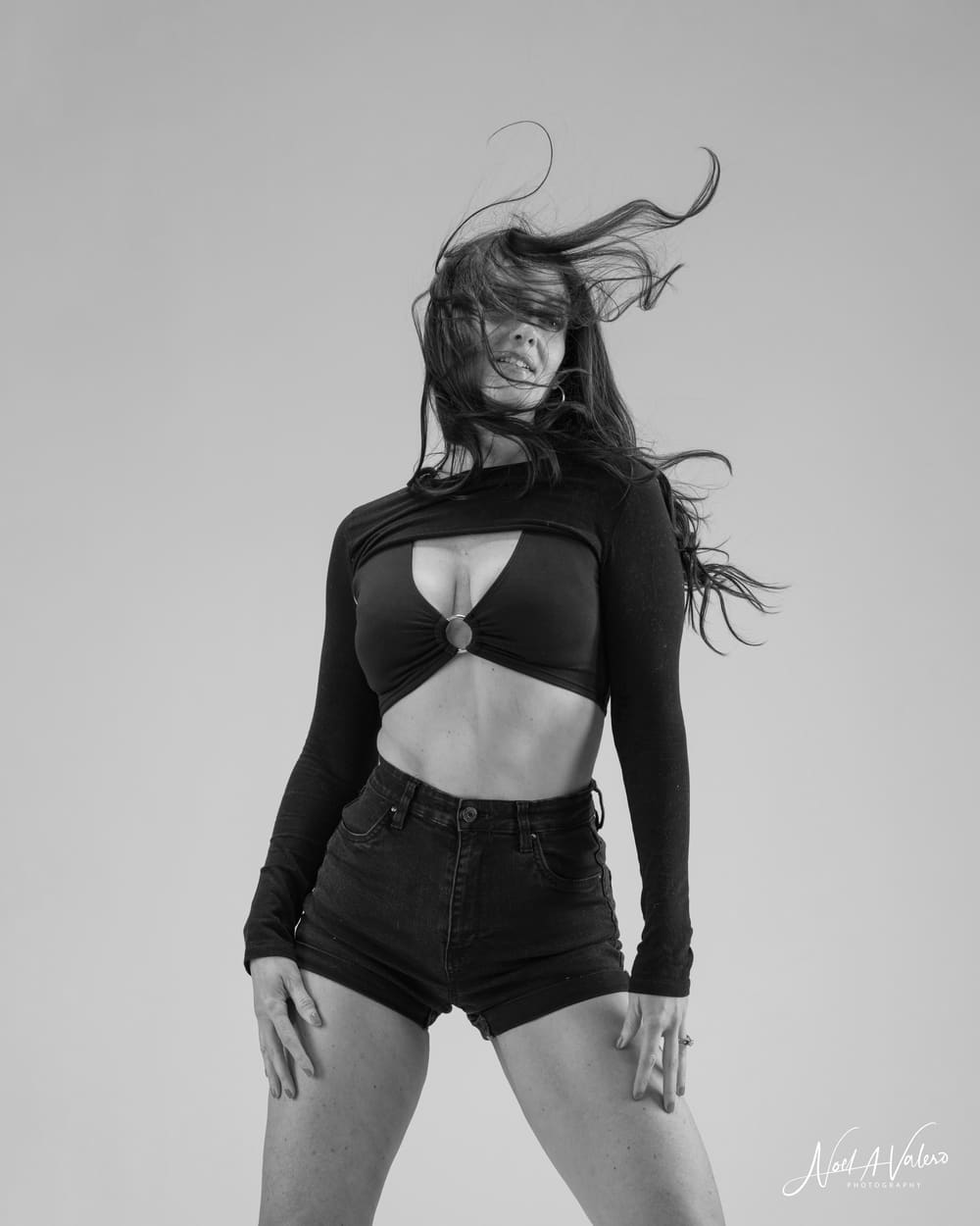 Black-and-white editorial with hair in motion